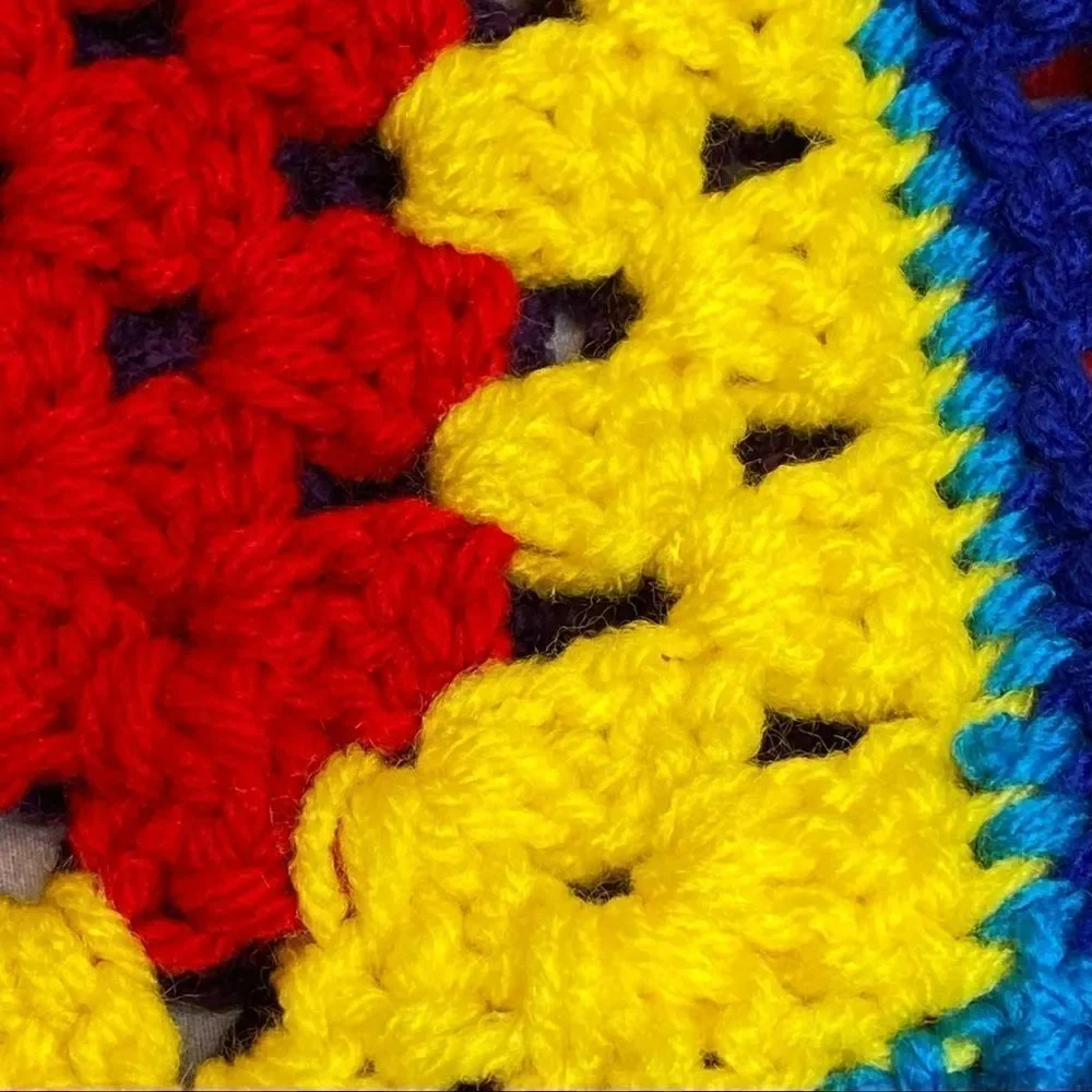 Hand crocheted bright multi colored Afghan size 56” X 31”